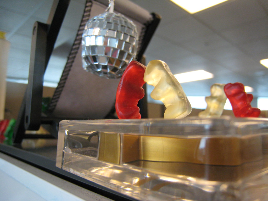 Gummy bears dancing under a disco ball